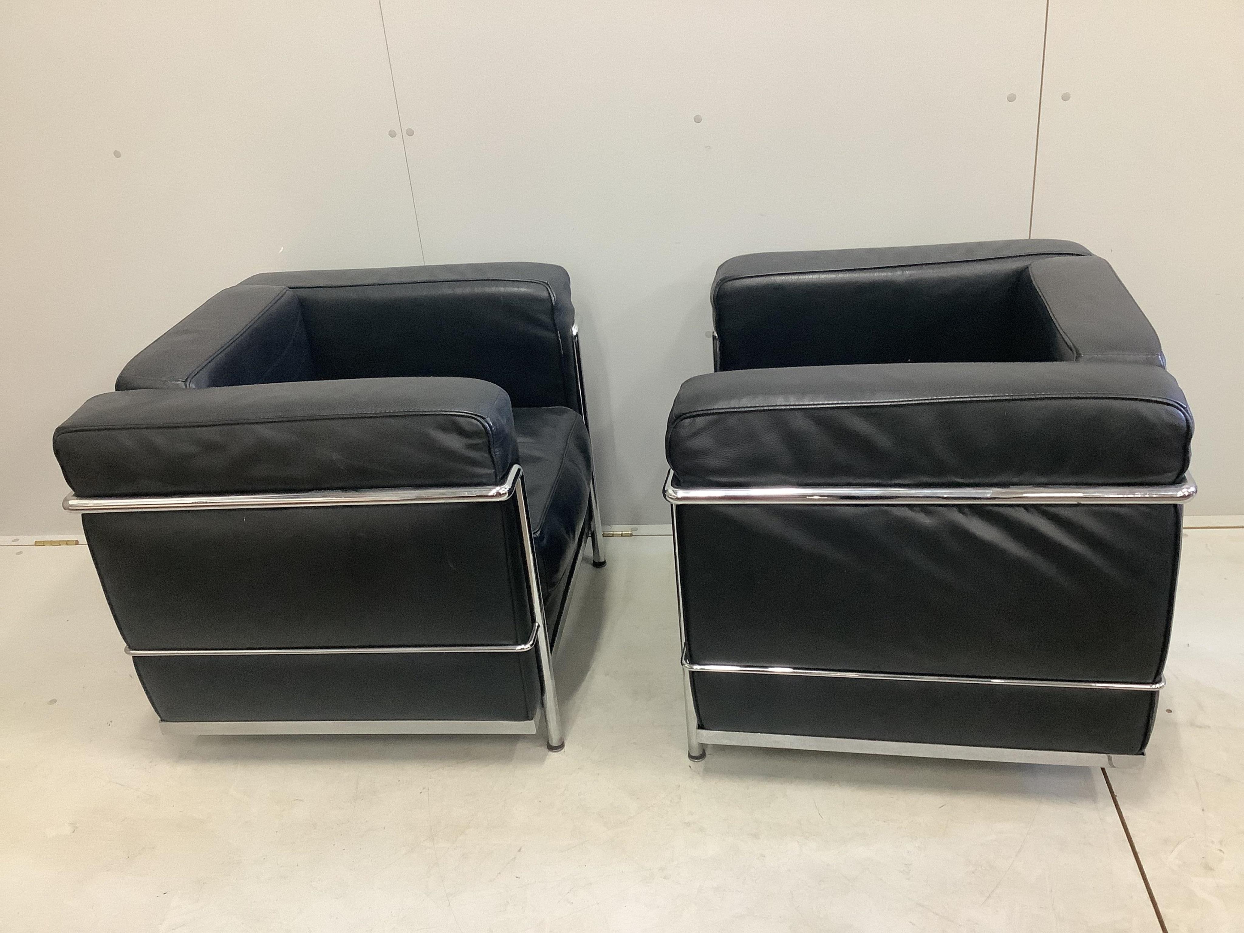 A pair of Corbusier style chairs, width 75cm, depth 68cm, height 66cm. Condition - fair